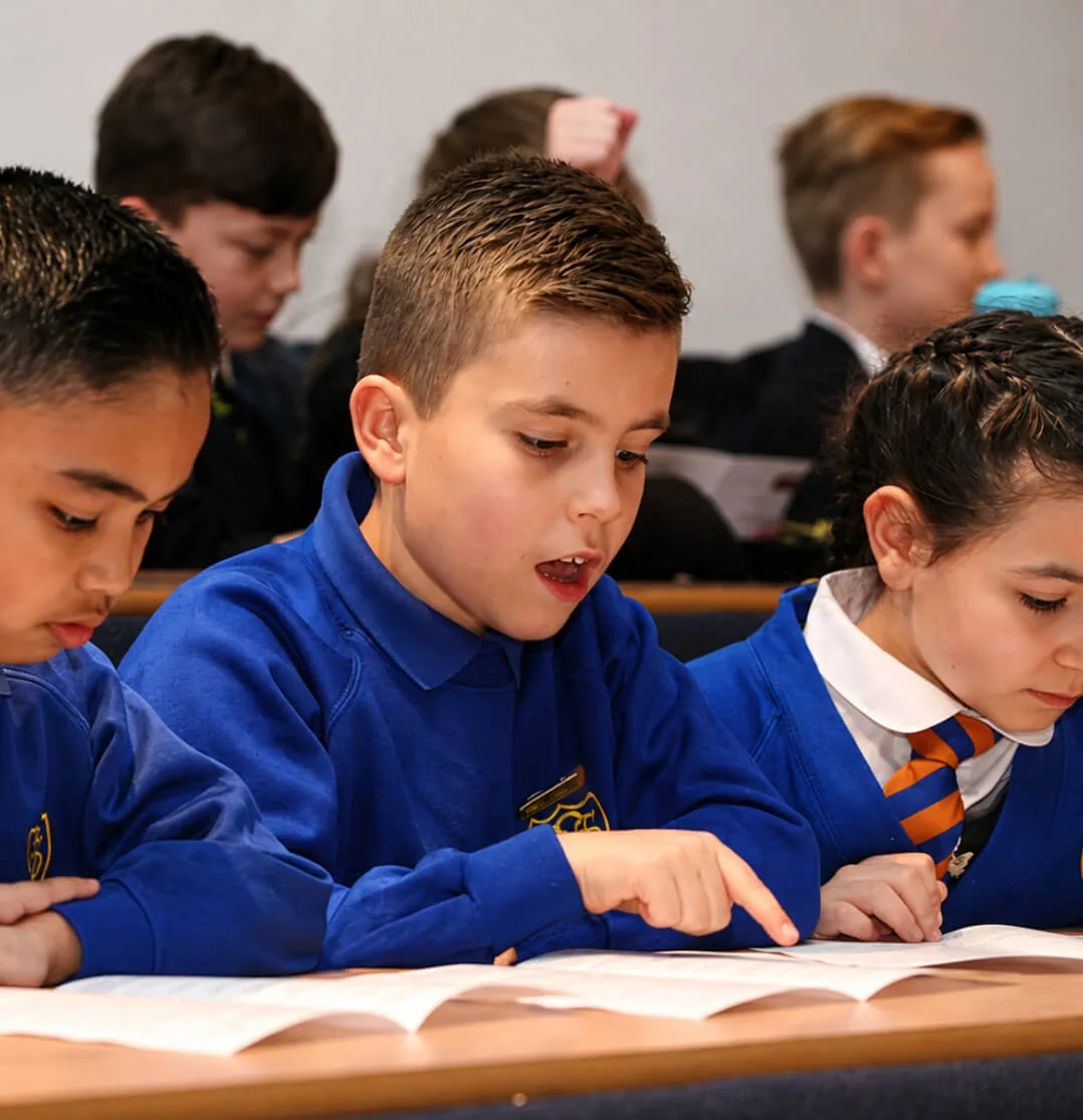 Schoolboys studying together in a classroom
